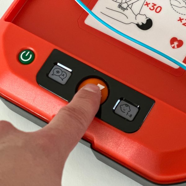 Primedic HeartSave Y Semi-Automatic Defibrillator Close up Button